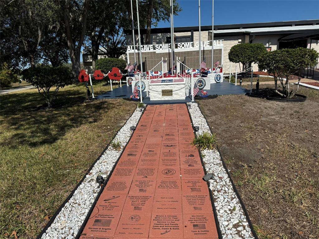9100 Highpoint Boulevard Brooksville, FL 34613 - Photo 31 of 42 a view of a chairs and tables in the patio