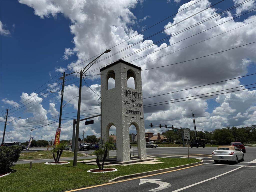 9100 Highpoint Boulevard Brooksville, FL 34613 - Photo 39 of 42 a view of a building with a yard