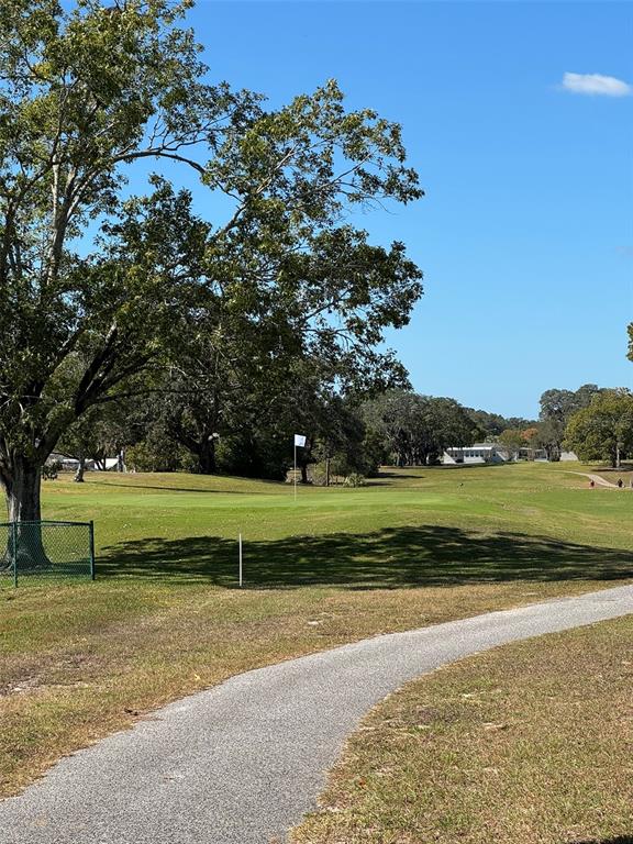 9100 Highpoint Boulevard Brooksville, FL 34613 - Photo 41 of 42 a view of lake with houses