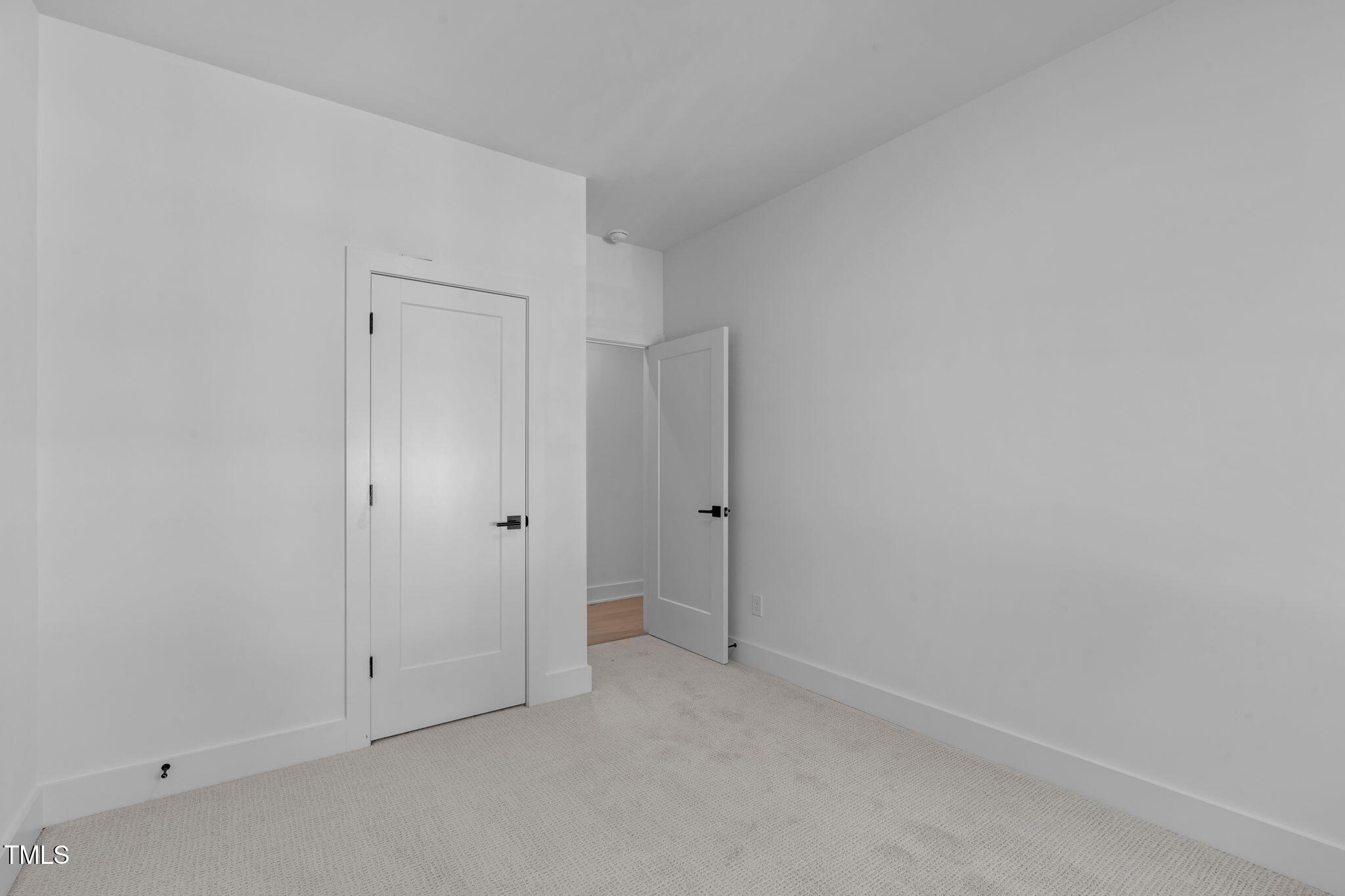 5061 Lundy Drive, Unit 101 Raleigh, NC 27606 - Photo 24 of 56 a view of an empty room