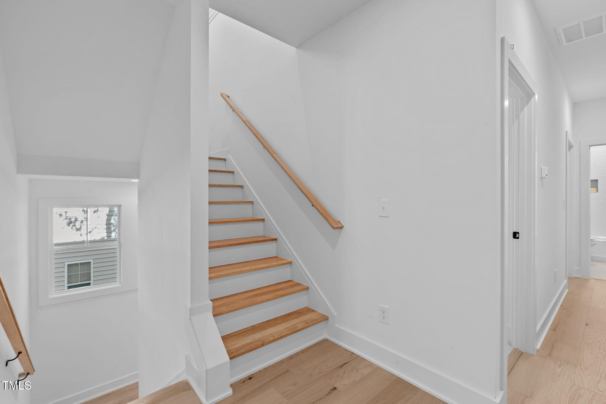5061 Lundy Drive, Unit 101 Raleigh, NC 27606 - Photo 28 of 56 a view of entryway with stairs