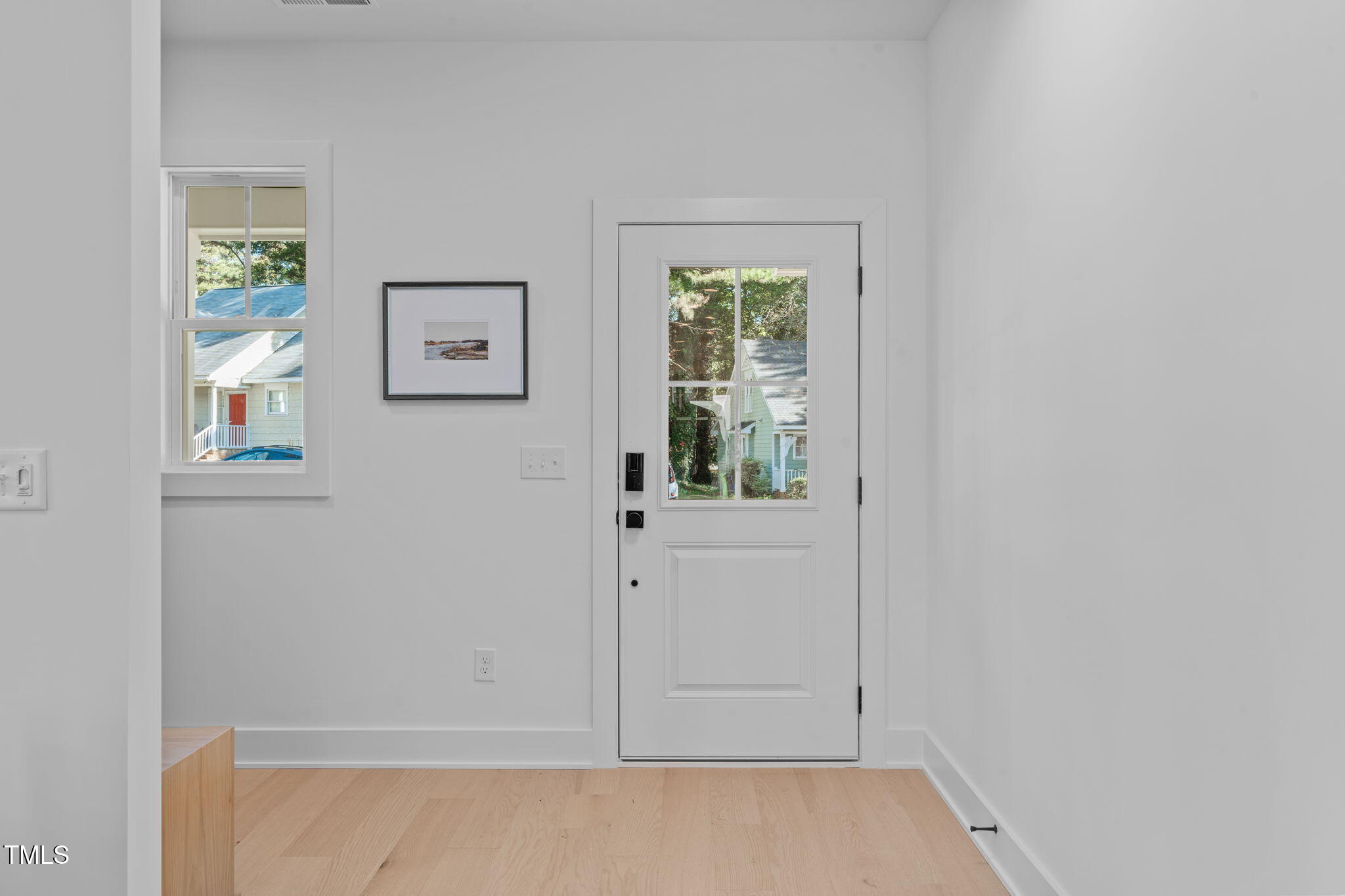 5061 Lundy Drive, Unit 101 Raleigh, NC 27606 - Photo 37 of 56 an empty room with windows