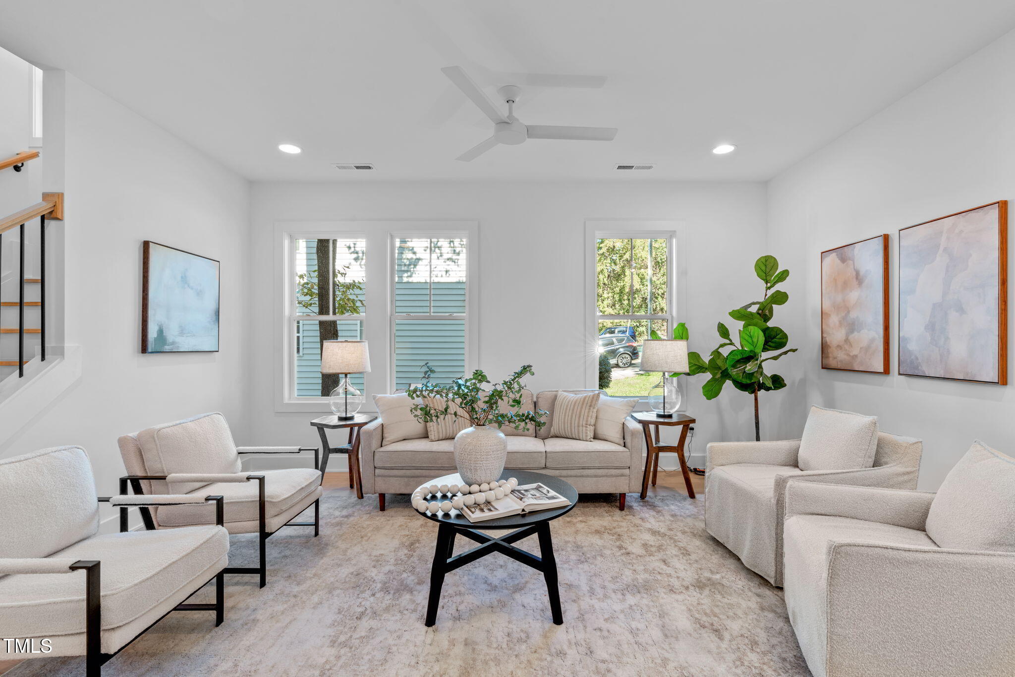 5061 Lundy Drive, Unit 101 Raleigh, NC 27606 - Photo 5 of 56 a living room with furniture rug and window
