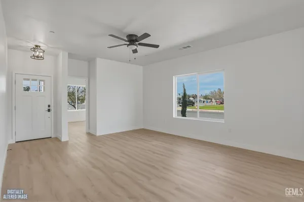 a view of an house with backyard and entertaining space