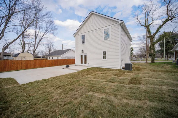 a view of a yard with a house