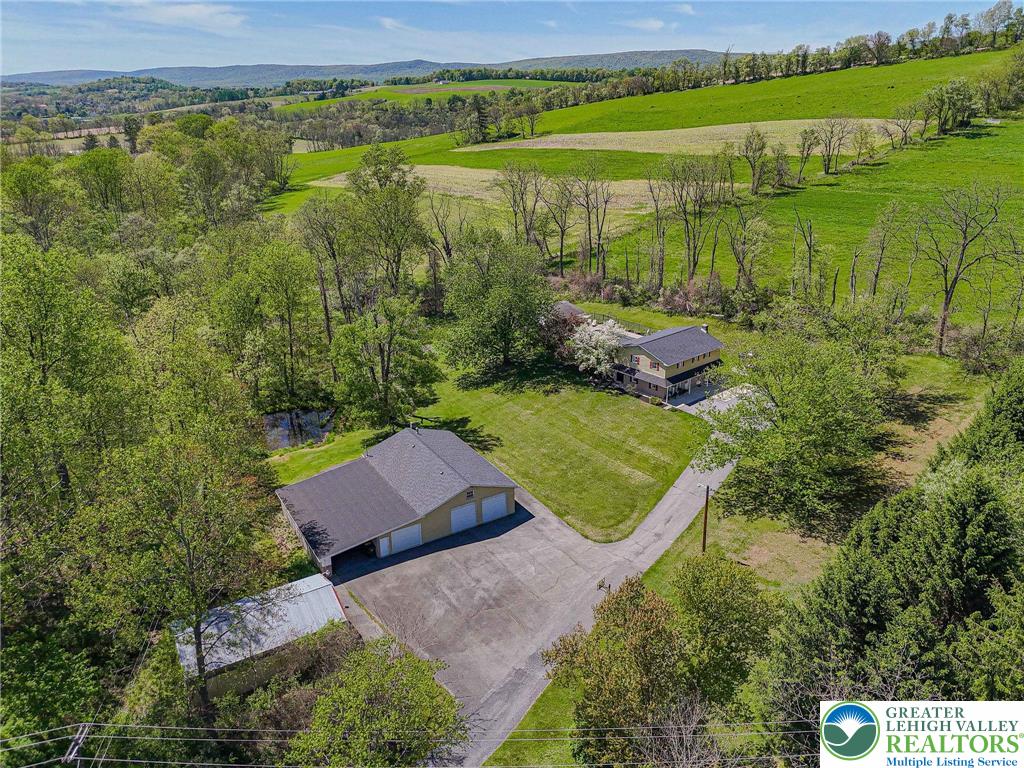 3857 Friedens Road Slatington, PA 18080 - Photo 6 of 75 This expansive estate offers abundant outdoor space and scenic views for tranquil living.