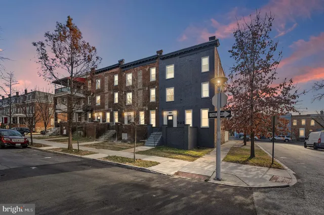 a front view of a building with street view