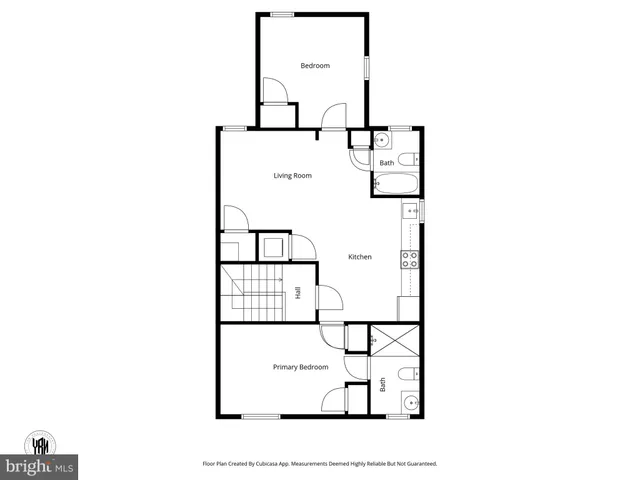 a picture of a bench in front of a wall