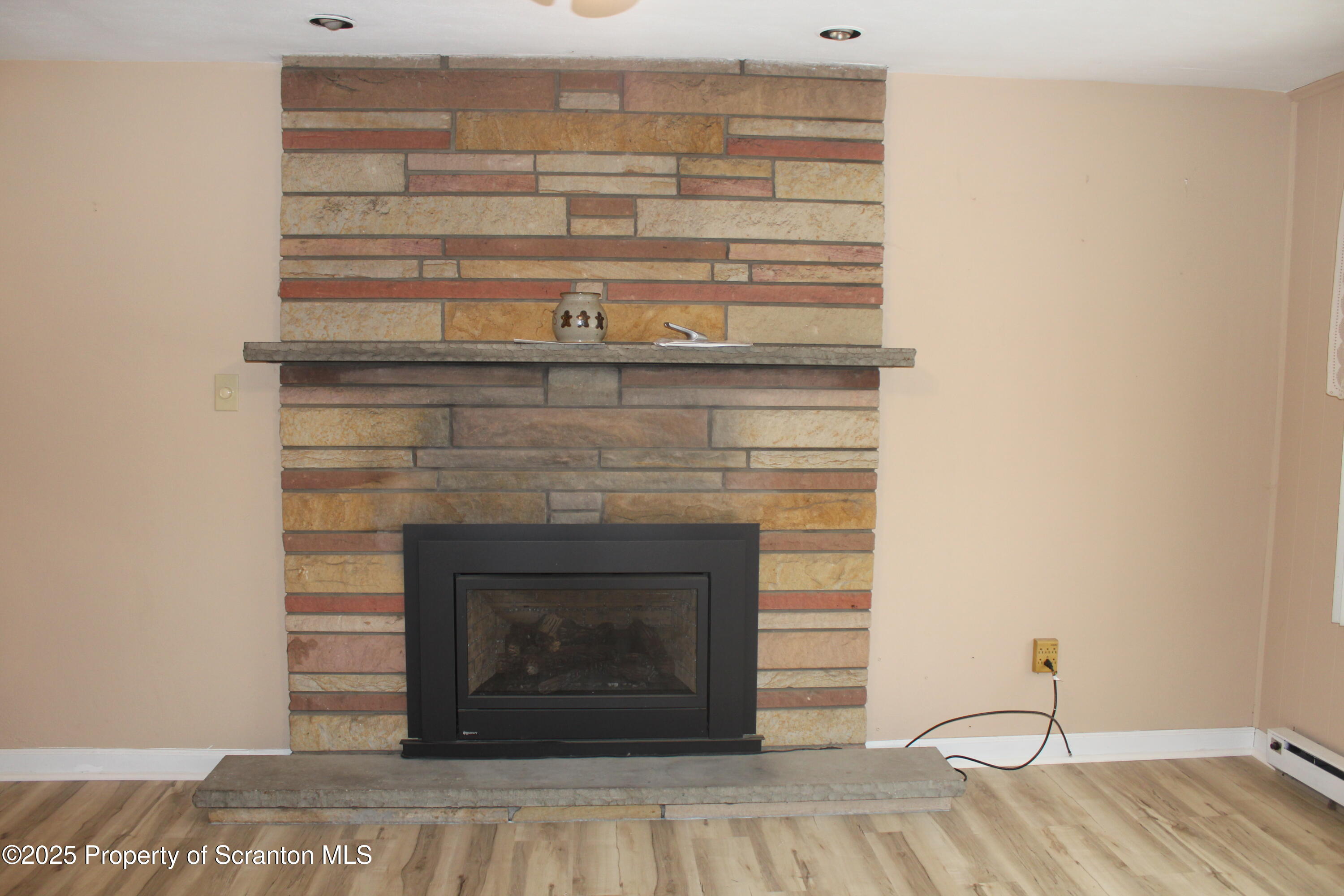 347 Terrace Avenue Shavertown, PA 18708 - Photo 12 of 59 a living room with a fireplace