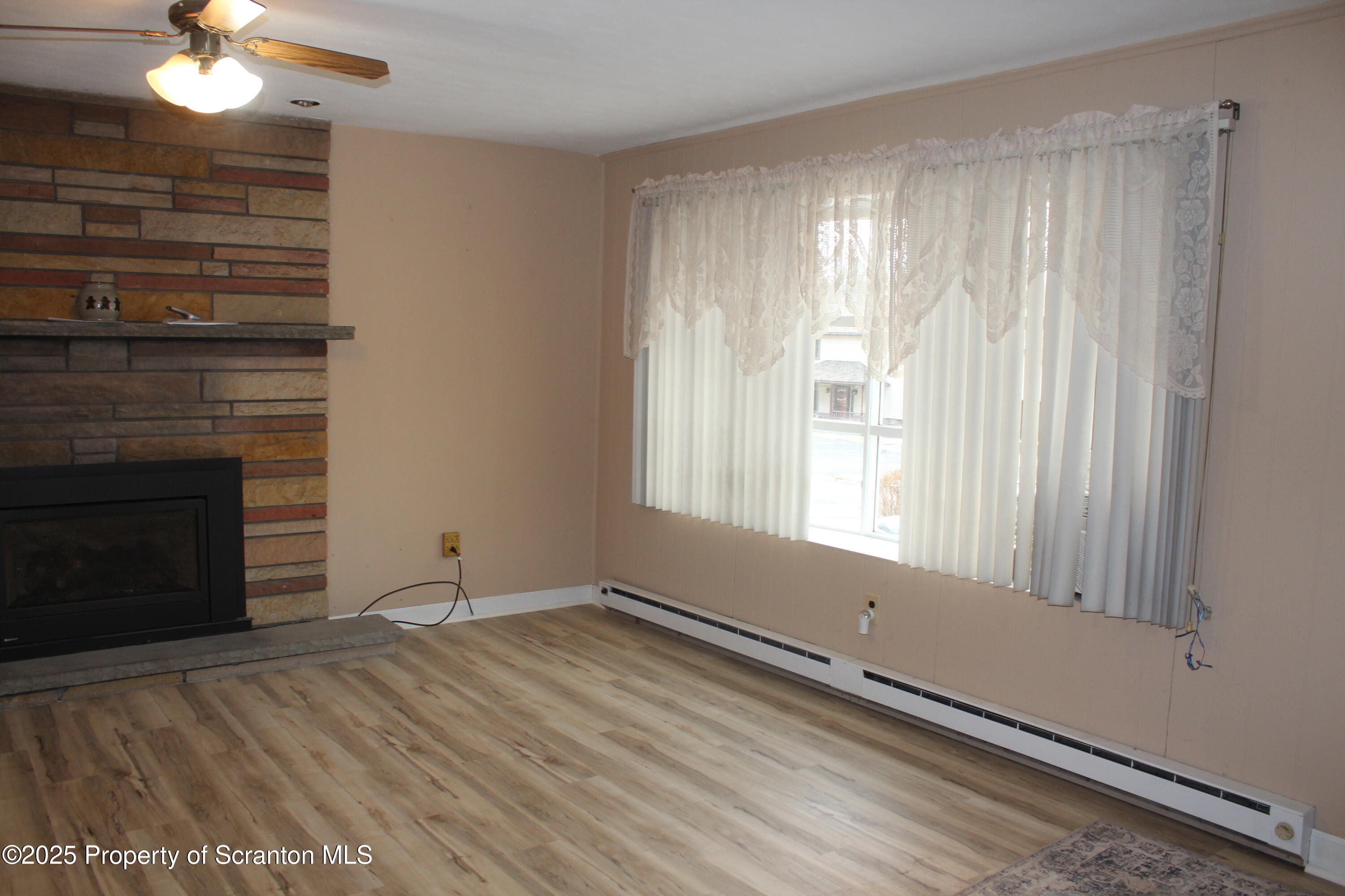 347 Terrace Avenue Shavertown, PA 18708 - Photo 14 of 59 a room with a fireplace and a window