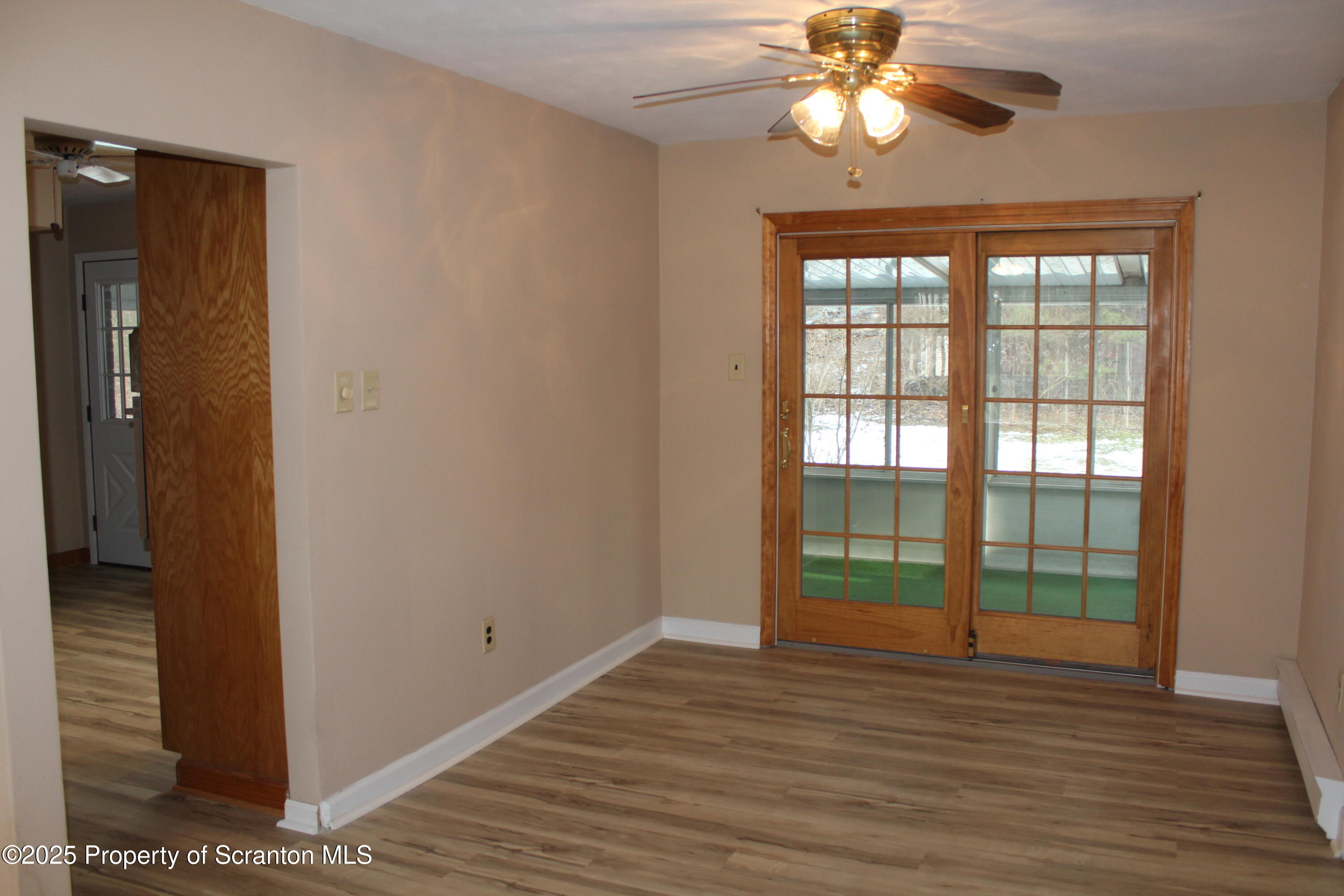 347 Terrace Avenue Shavertown, PA 18708 - Photo 17 of 59 a view of an empty room with window and wooden floor