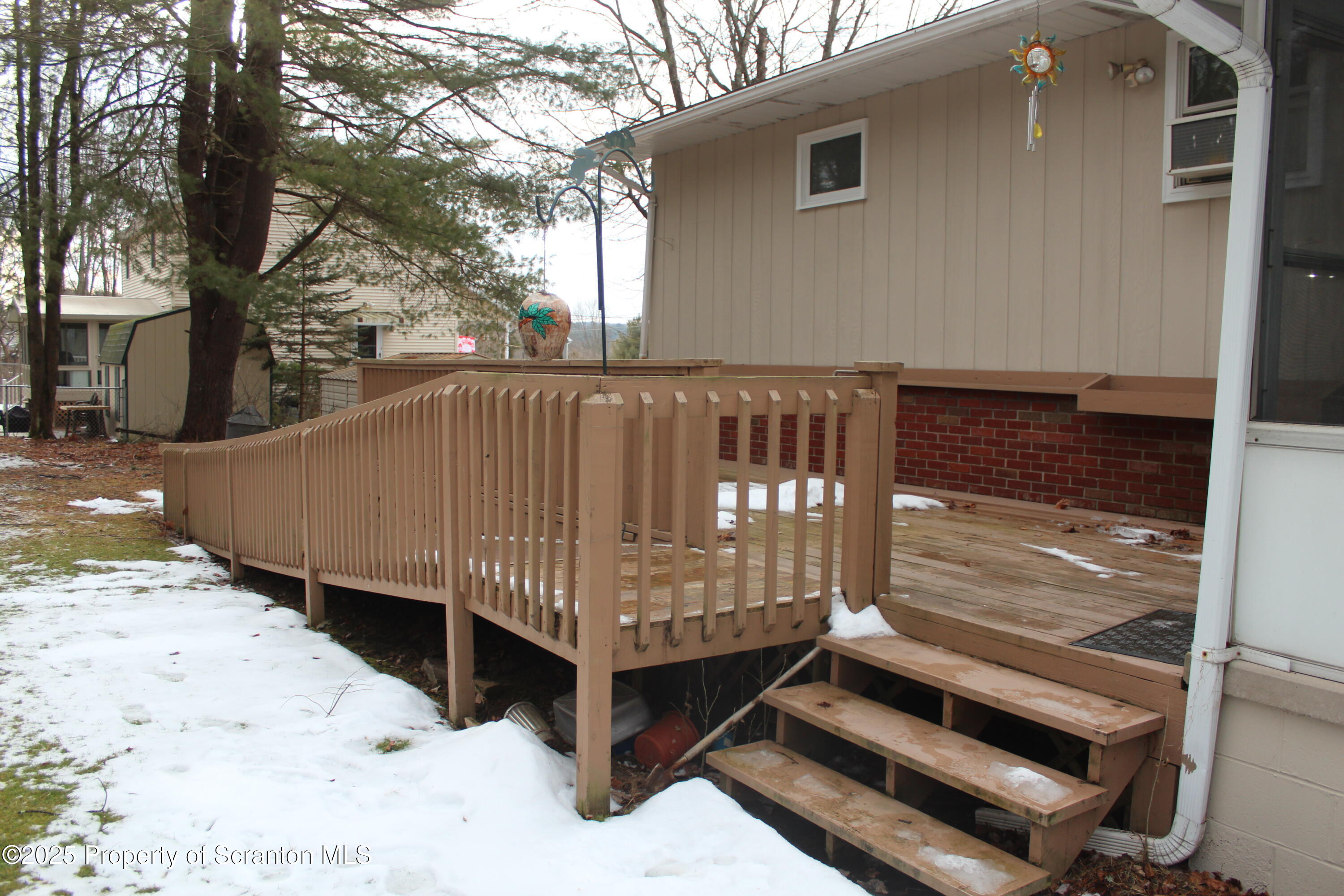 347 Terrace Avenue Shavertown, PA 18708 - Photo 43 of 59 a view of a backyard with a wooden fence