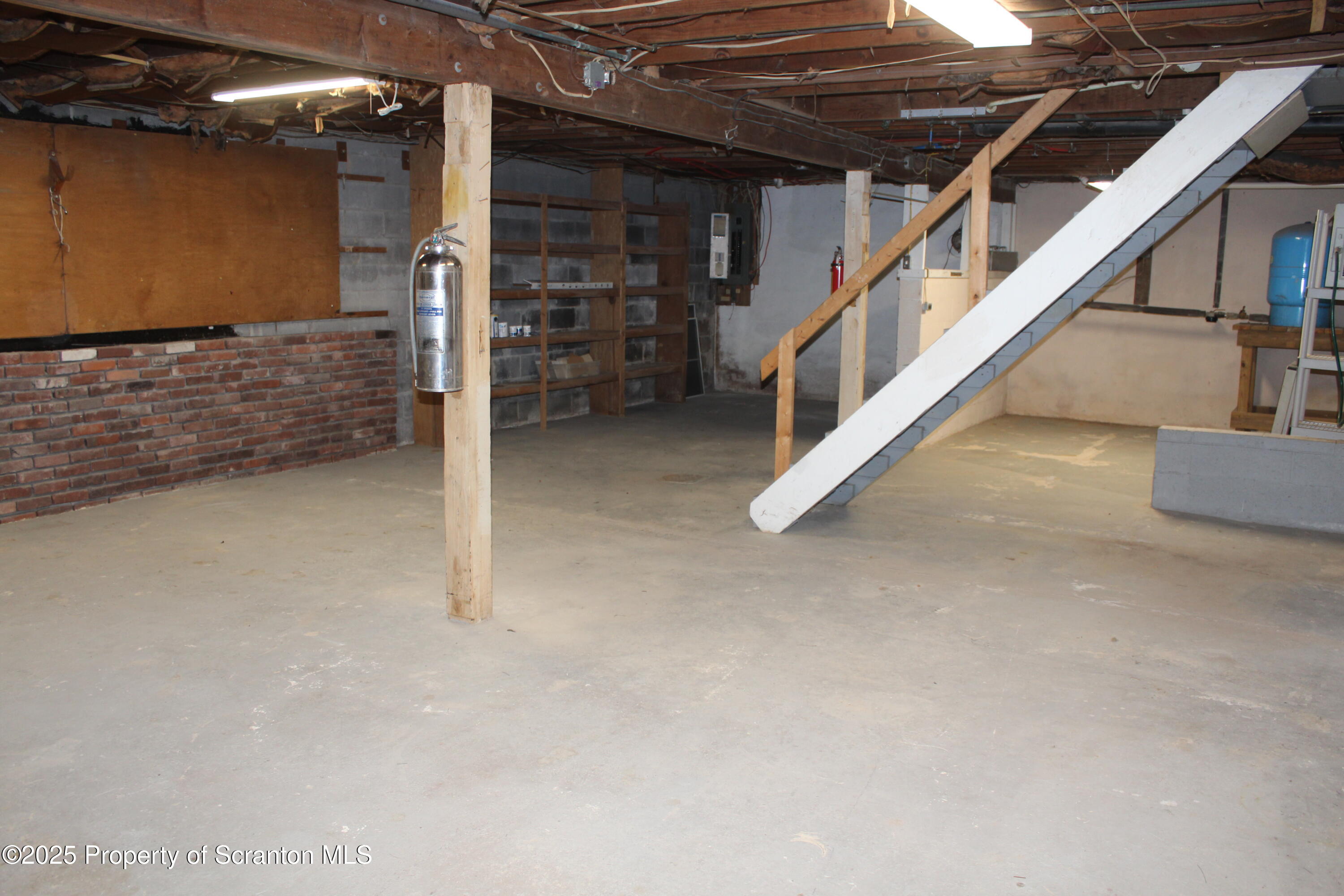 347 Terrace Avenue Shavertown, PA 18708 - Photo 56 of 59 a view of an empty room with stairs