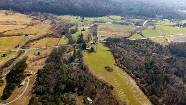 a view of a house with a swimming pool