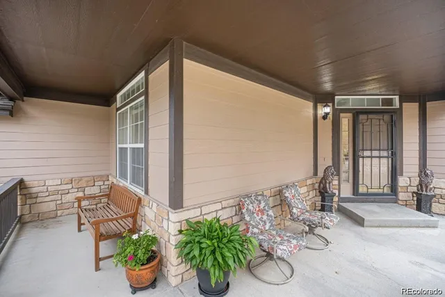 a front view of a house with patio