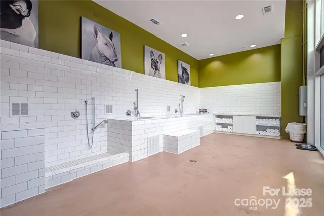 a bathroom with a sink a mirror and a bathtub