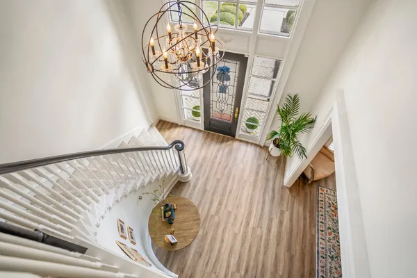 a view of entryway with wooden floor