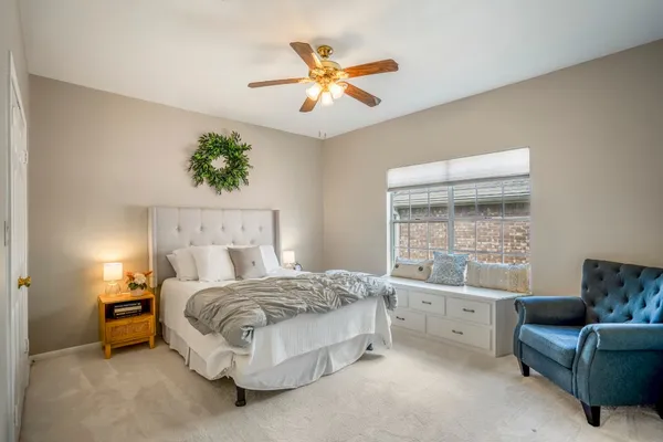 a bed room with a bed and a couch