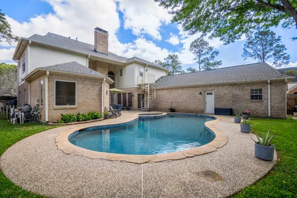 a view of a house with a swimming pool