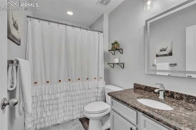 a utility room with a sink a washer and dryer