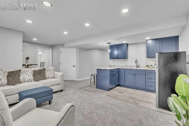 a view of hall way with furniture