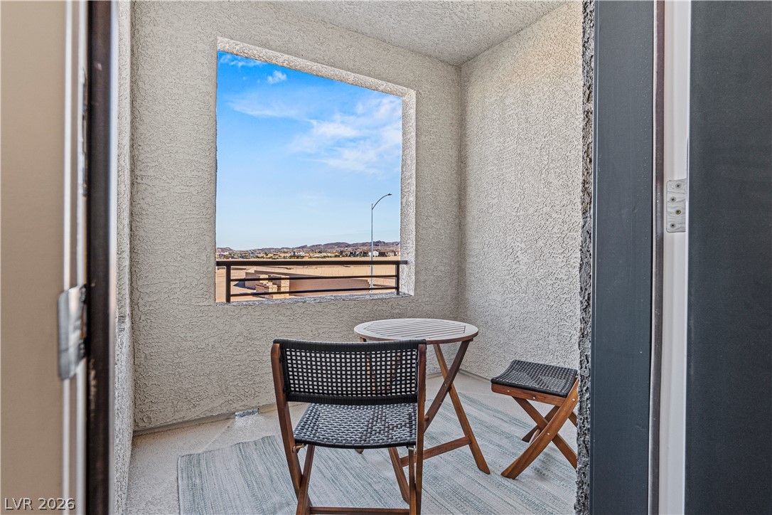 313 Keyboard Place Henderson, NV 89015 - Photo 11 of 22 Enjoy peaceful moments and distant mountain vistas from this intimate balcony retreat.