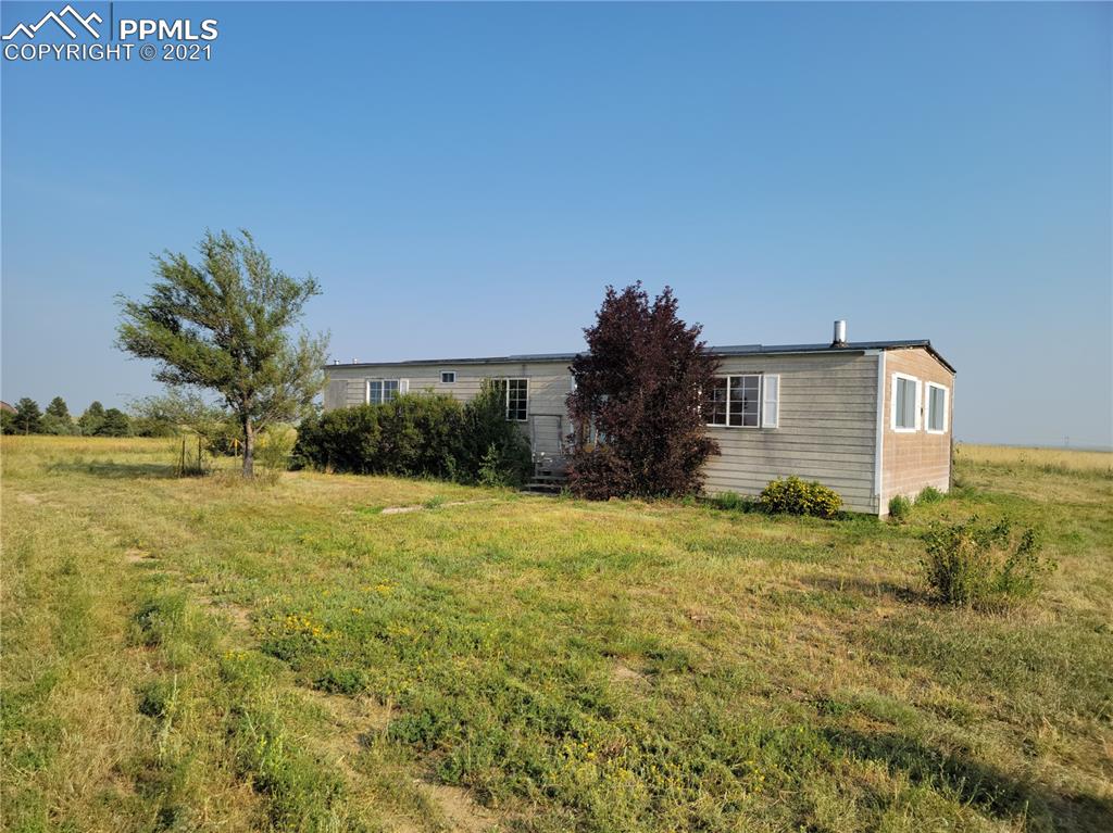 40915 Funk Road Ramah, CO 80832 - Photo 1 of 23 a backyard of a house