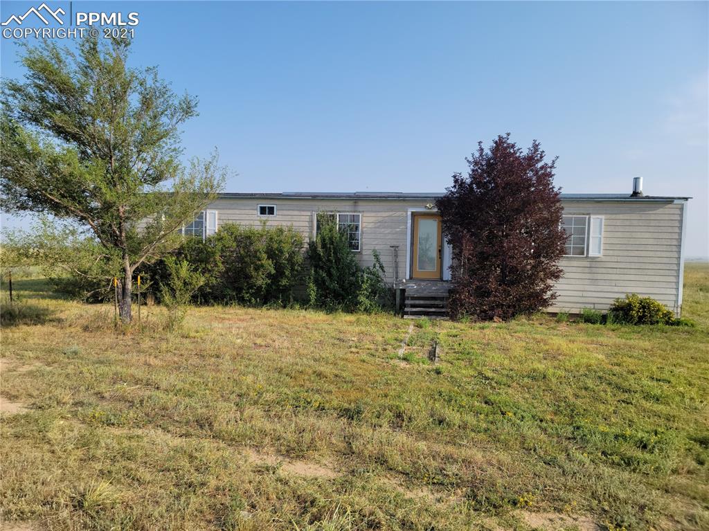 40915 Funk Road Ramah, CO 80832 - Photo 2 of 23 a house view with a outdoor space