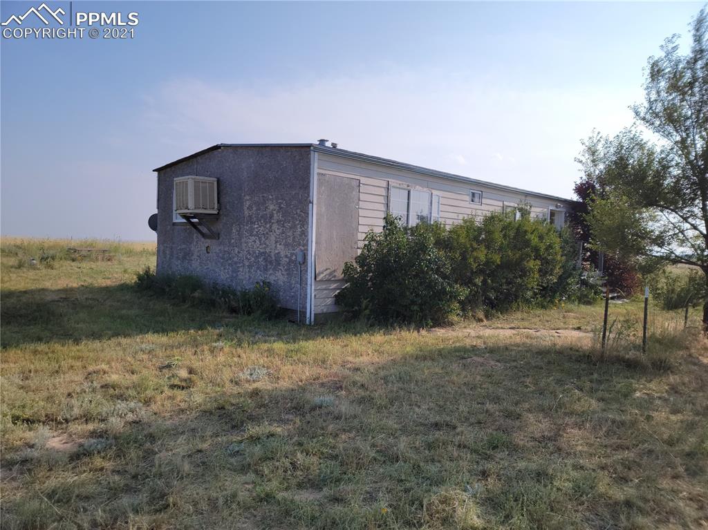 40915 Funk Road Ramah, CO 80832 - Photo 12 of 23 a backyard of a house with lots of green space