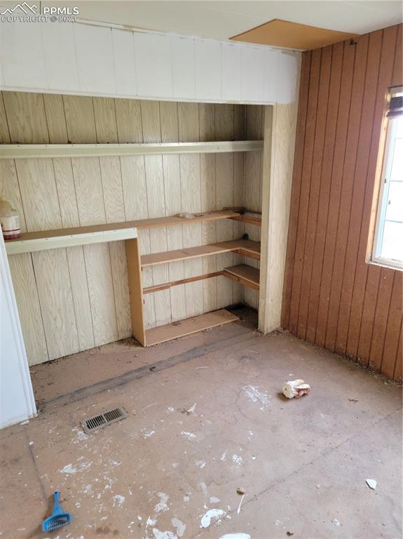 40915 Funk Road Ramah, CO 80832 - Photo 15 of 23 a view of an empty room with cabinet and a window