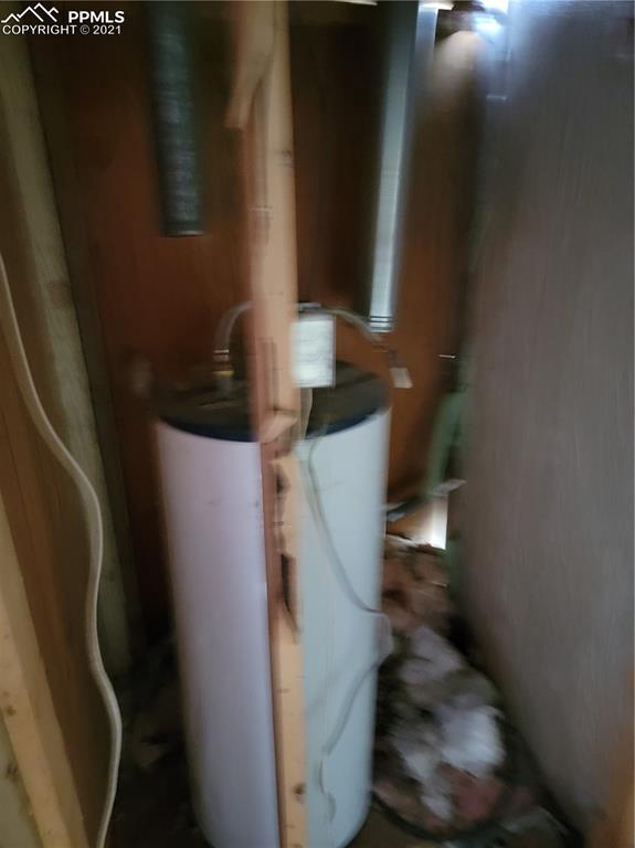 40915 Funk Road Ramah, CO 80832 - Photo 18 of 23 a bathroom with a toilet and a mirror