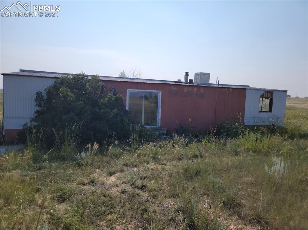 40915 Funk Road Ramah, CO 80832 - Photo 22 of 23 a view of a dry yard with trees