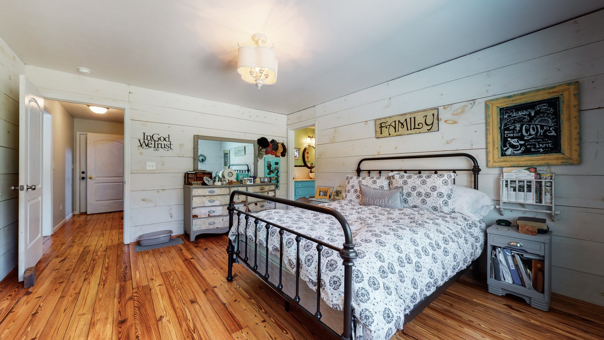 729 Dabbsy Ford Road Decherd, TN 37324 - Photo 18 of 25 a bedroom with a bed and wooden floor
