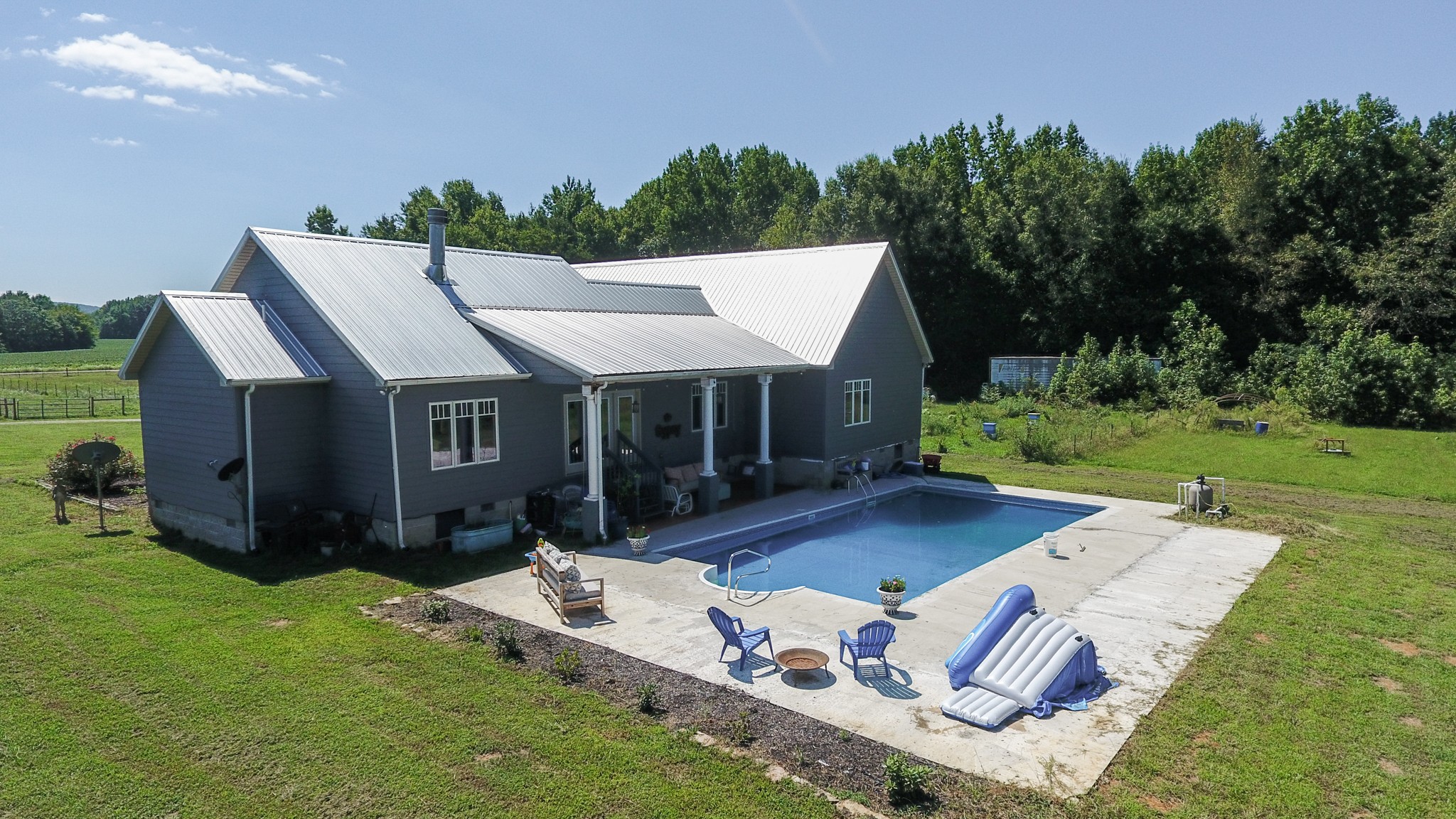 729 Dabbsy Ford Road Decherd, TN 37324 - Photo 3 of 25 a view of house with backyard outdoor seating and green space