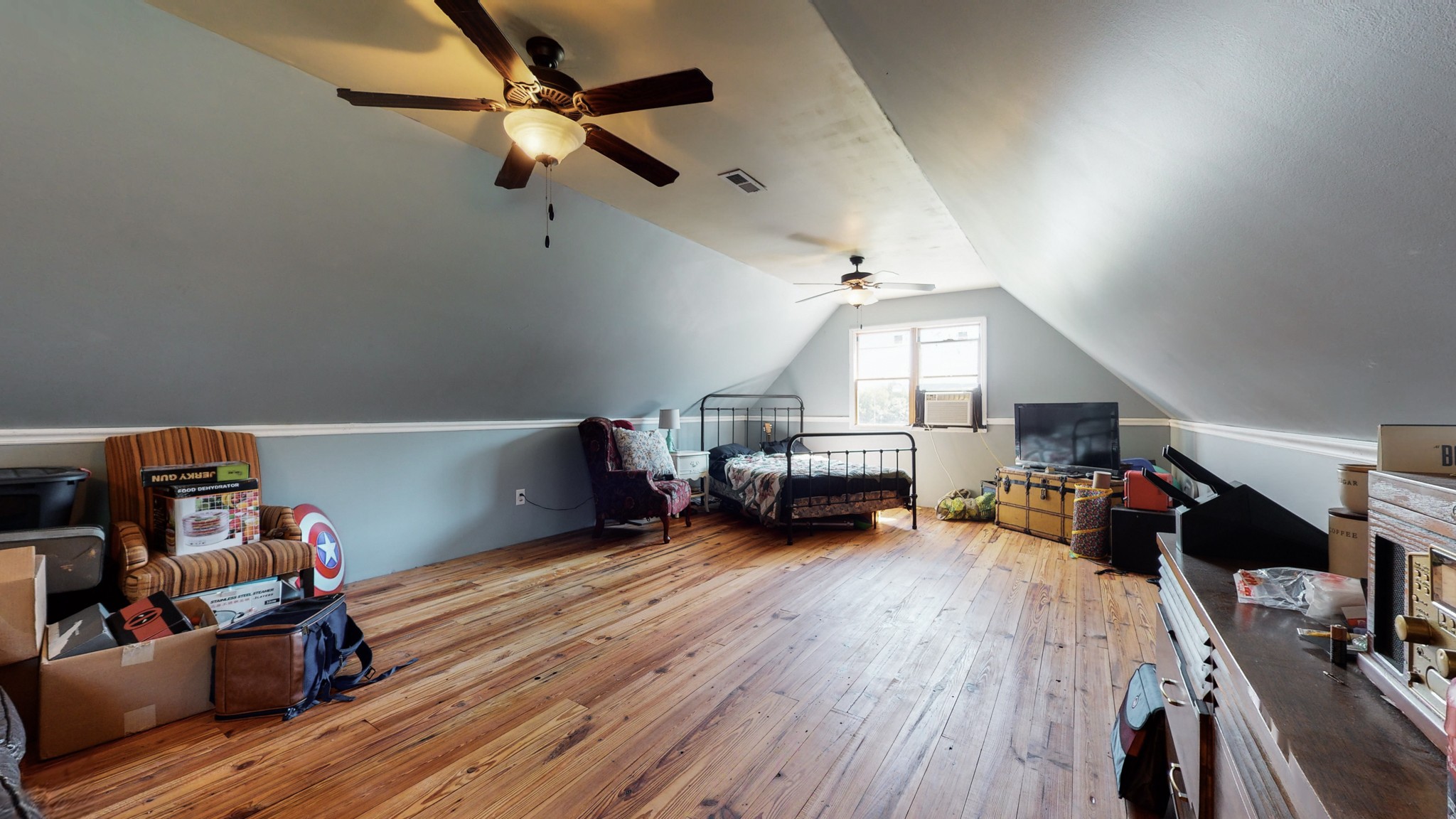729 Dabbsy Ford Road Decherd, TN 37324 - Photo 24 of 25 a living room with furniture and a wooden floor