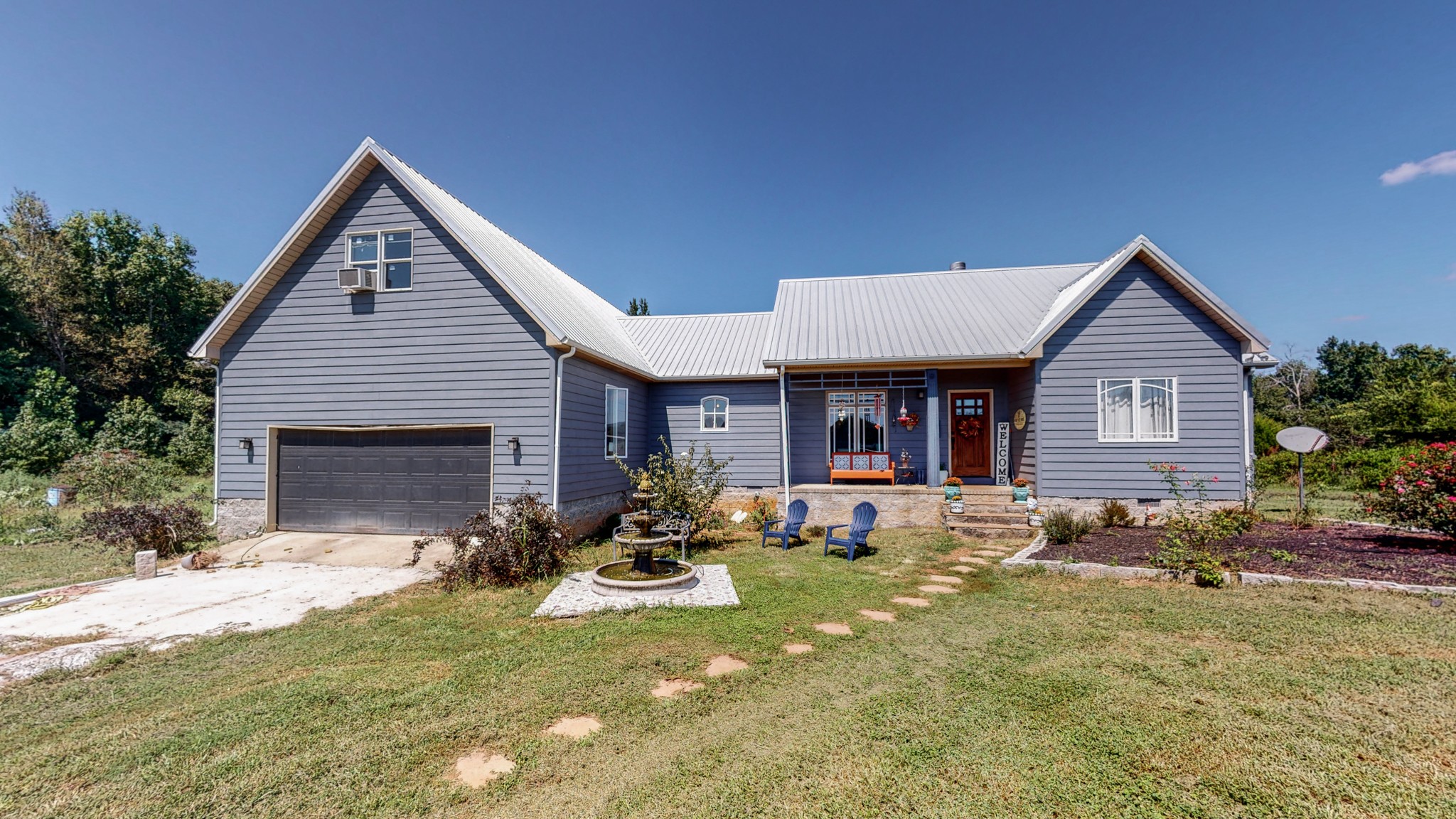 729 Dabbsy Ford Road Decherd, TN 37324 - Photo 25 of 25 a front view of a house with patio