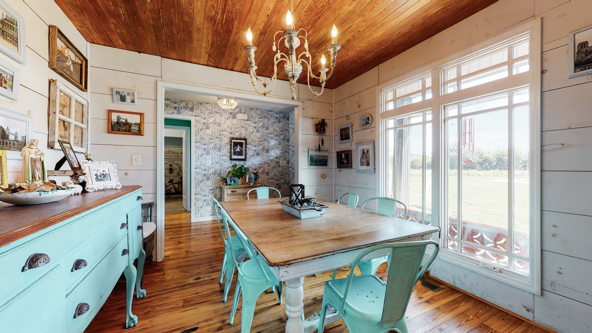 729 Dabbsy Ford Road Decherd, TN 37324 - Photo 9 of 25 a view of a dining room with furniture and wooden floor