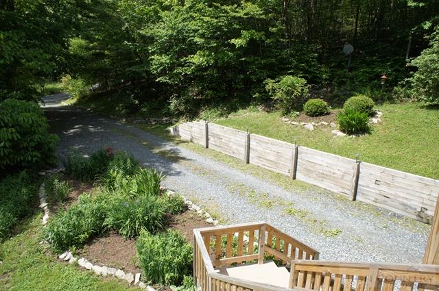 757 Old Farm Road Banner Elk, NC 28604 - Photo 9 of 35 a view of a yard with an outdoor seating