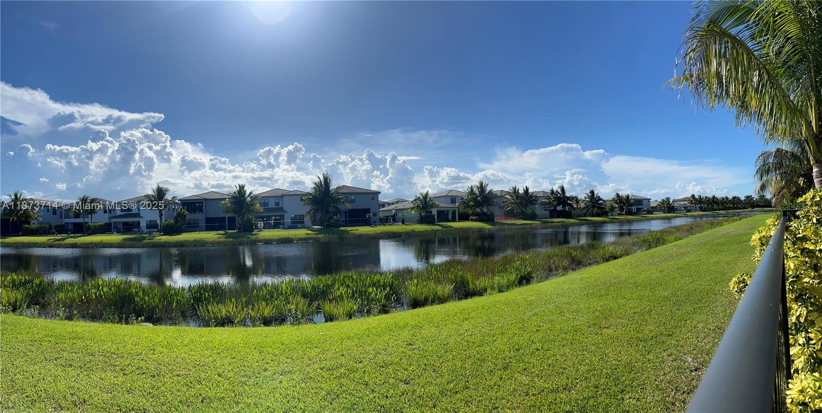 17267 Windy Pointe Lane Boca Raton, FL 33496 - Photo 20 of 47 a view of a lake with a city