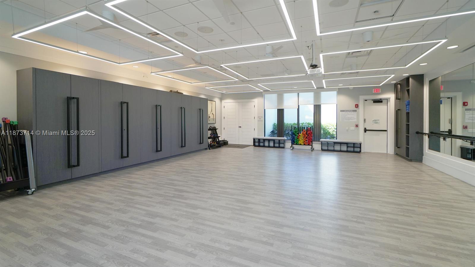 17267 Windy Pointe Lane Boca Raton, FL 33496 - Photo 36 of 47 a view of a hall with wooden floor