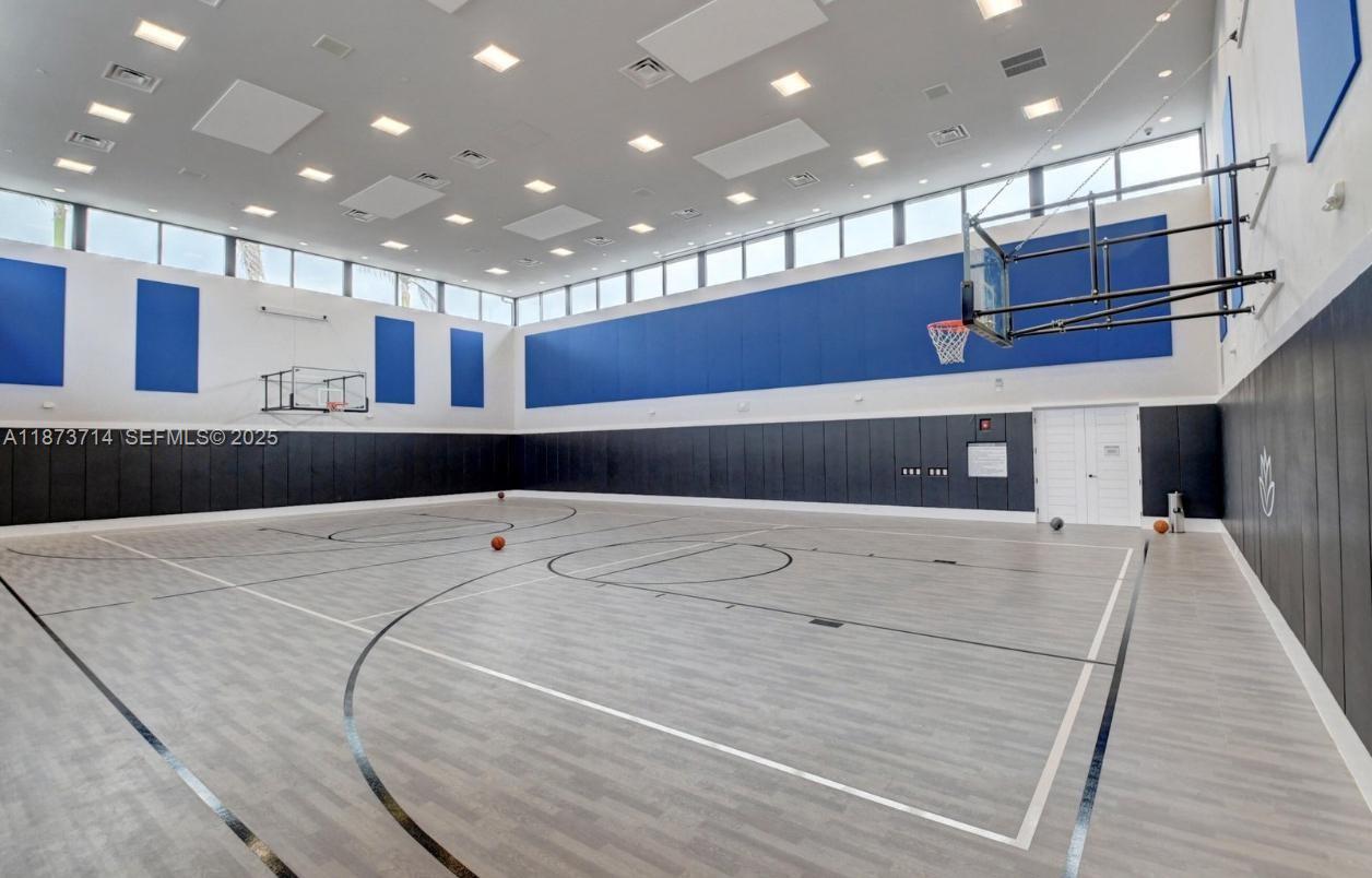 17267 Windy Pointe Lane Boca Raton, FL 33496 - Photo 40 of 47 a view of a kitchen with a dishwasher and cabinets