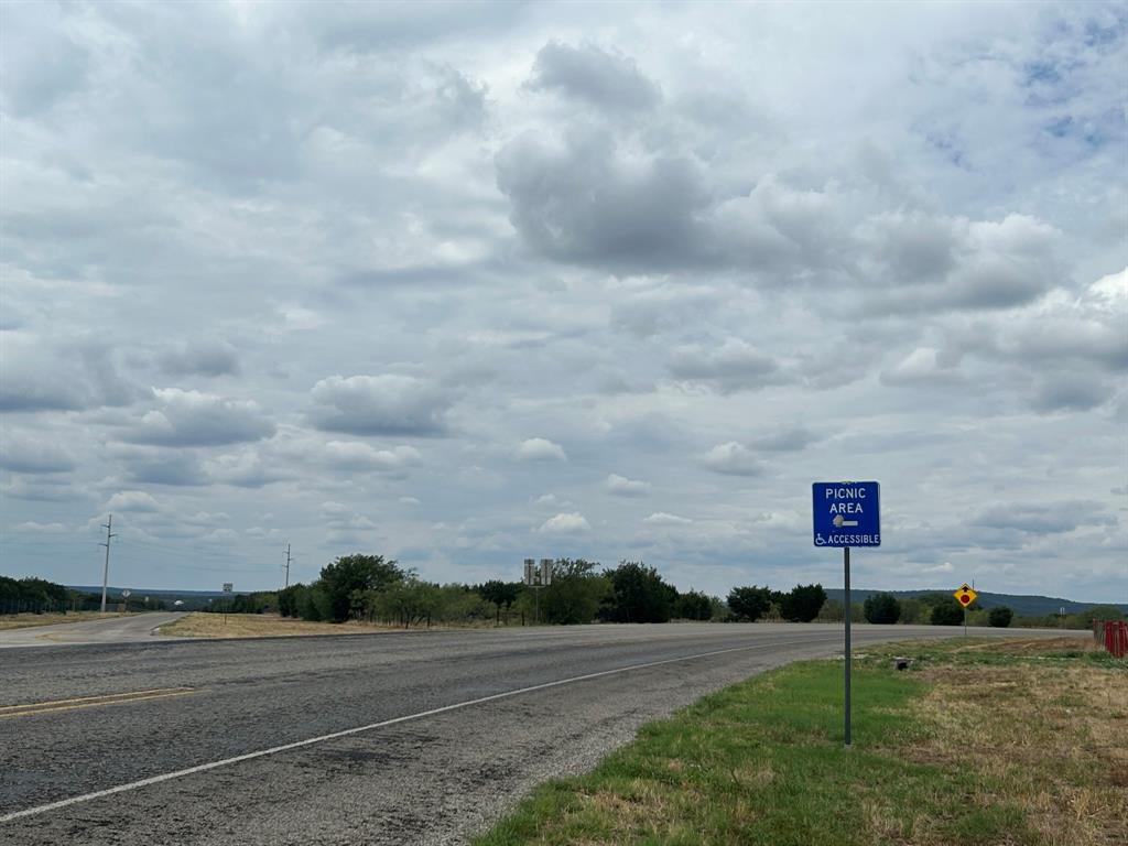 16 North N Loop Graford, TX 76449 - Photo 16 of 19 a view of a road with big yard