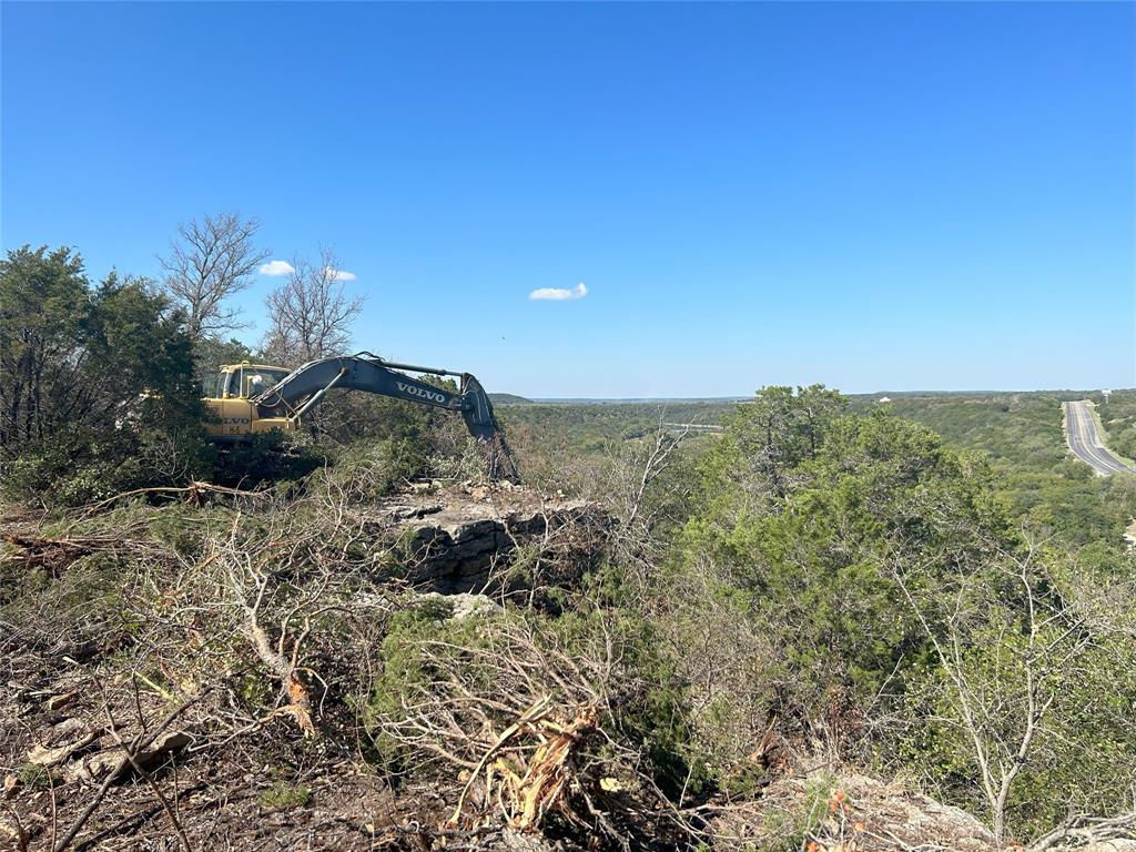 16 North N Loop Graford, TX 76449 - Photo 3 of 19 a view of a dry yard with lots of bushes