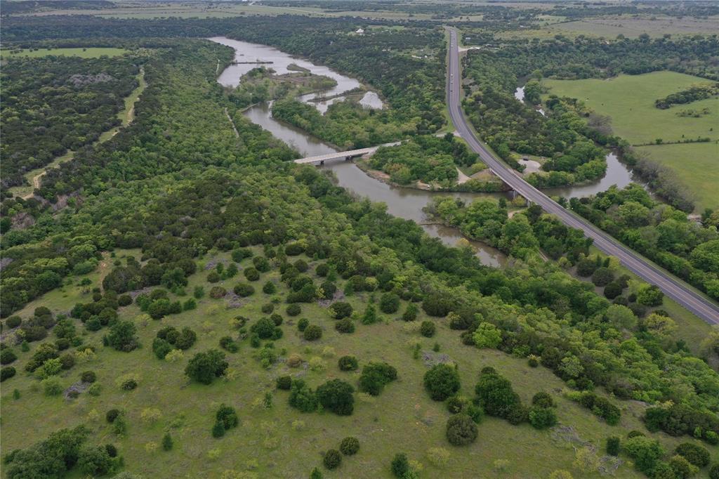 16 North N Loop Graford, TX 76449 - Photo 5 of 19 a view of a lake with a yard
