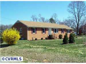 9312 Reams Road Richmond, VA 23236 - Photo 1 of 10 a view of a house with a yard