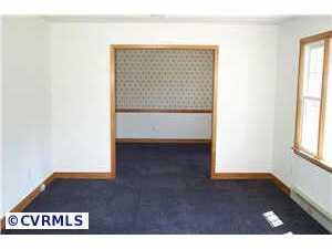 9312 Reams Road Richmond, VA 23236 - Photo 7 of 10 a view of an empty room and window