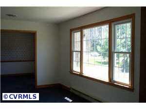 9312 Reams Road Richmond, VA 23236 - Photo 8 of 10 a view of an empty room with a window