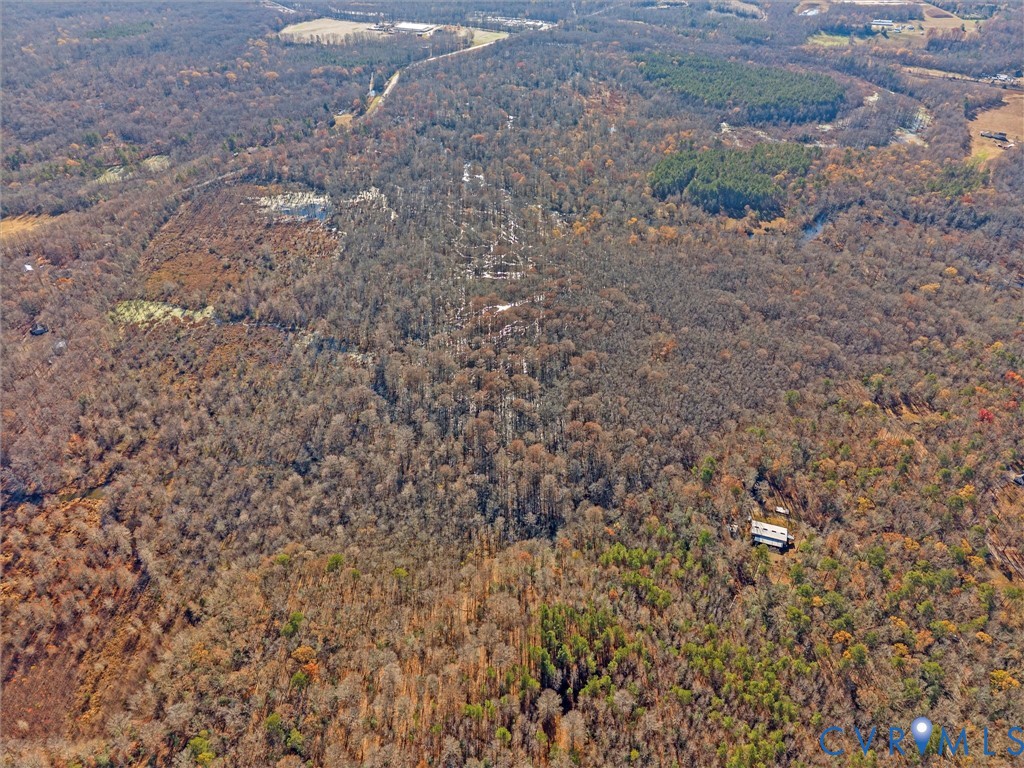 58-xx Toe Ink Terrace Quinton, VA 23141 - Photo 7 of 16 a view of a yard with a tree