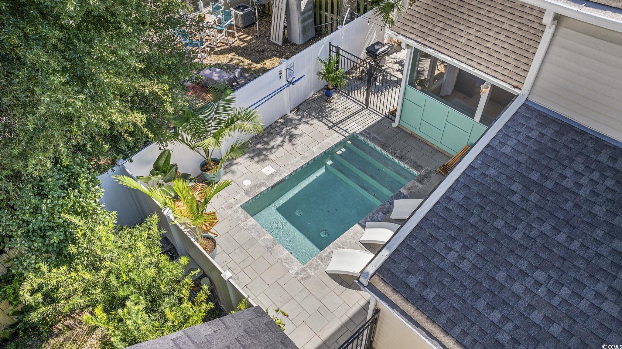 104 Ash Street North Myrtle Beach, SC 29582 - Photo 35 of 39 Drone / aerial view of a pool area