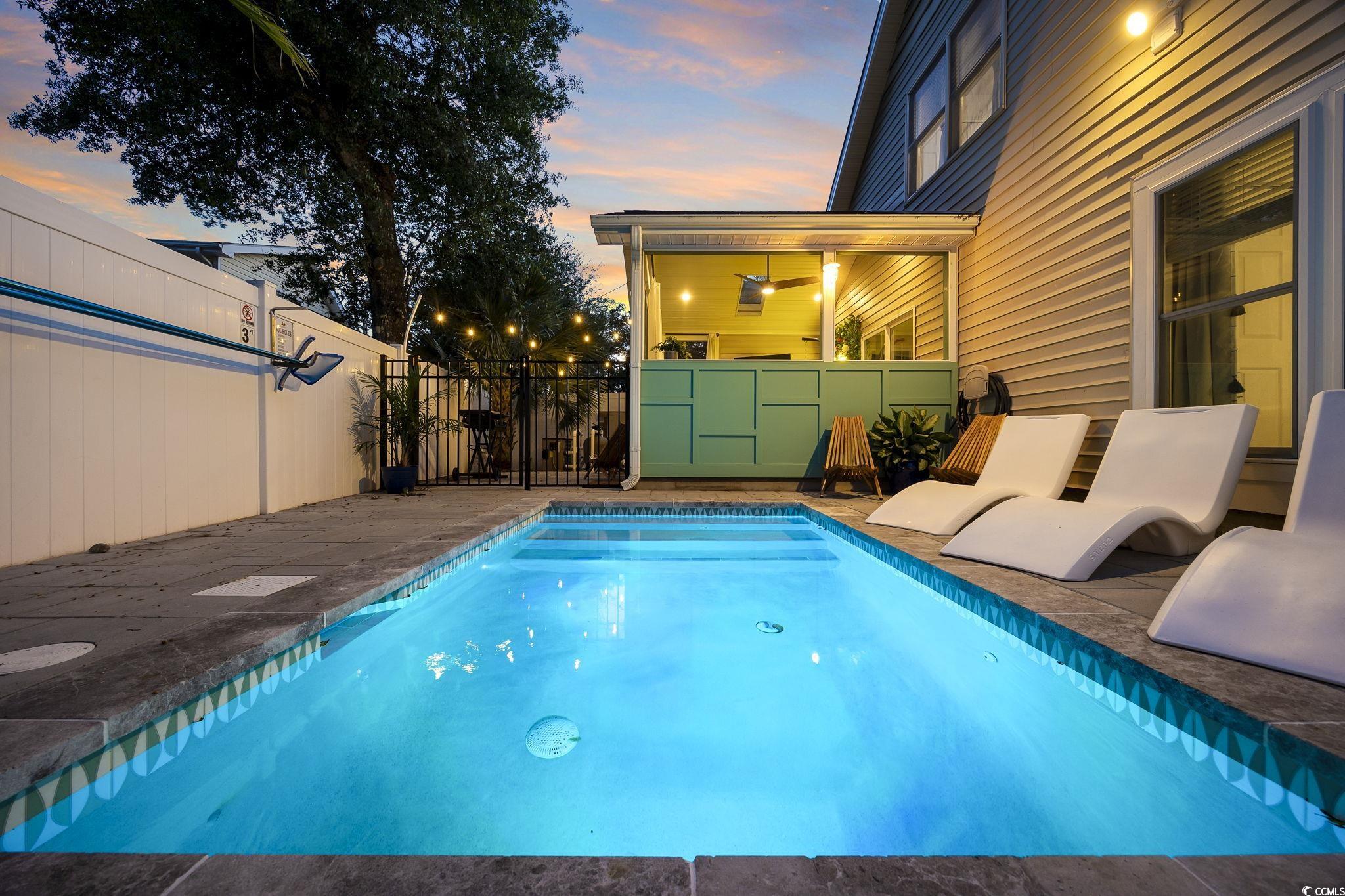 104 Ash Street North Myrtle Beach, SC 29582 - Photo 36 of 39 View of pool featuring a patio area